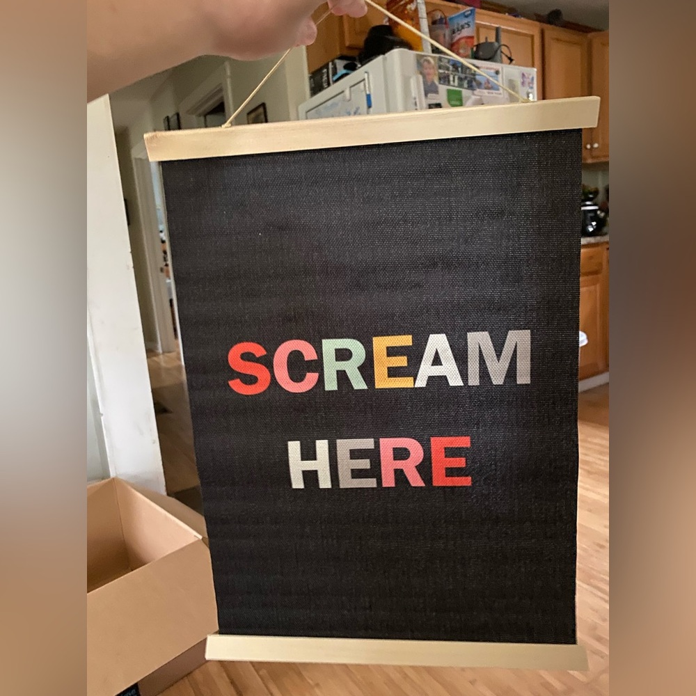 Black Wall Hanging with Colorful Text